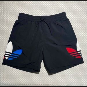 Adidas Black Male Swim Shorts with Red, White, and Blue logos on legs in size S